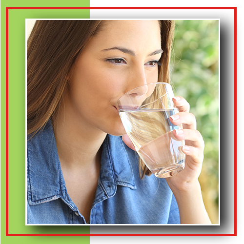 Image of a woman drinking fresh water